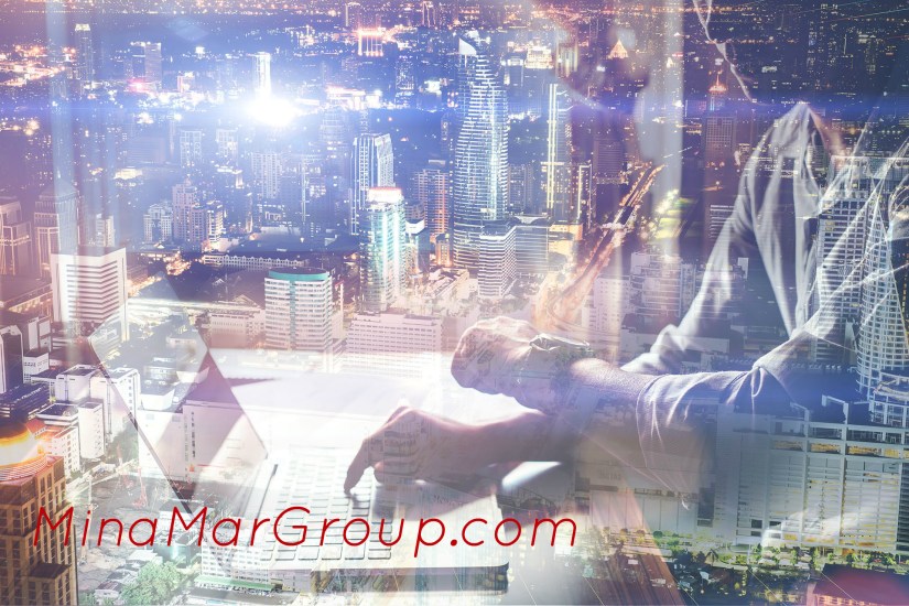 Close-up of male hands using laptop in home.